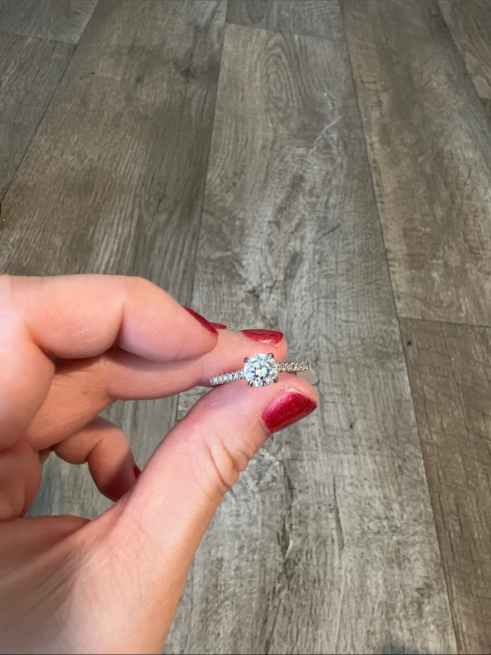 Classic White Gold Solitaire Engagement Ring with Pavé Band